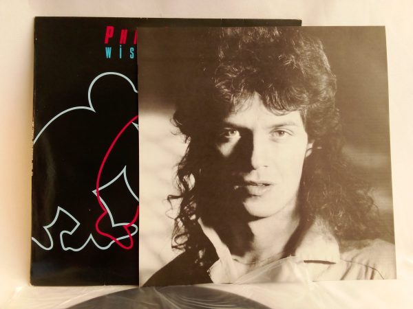 Phil Carmen: Wise Monkeys, Phil Carmen, vinilos de Phil Carmen, Pop Rock, Synth-pop, discos de vinilo Pop Rock, vinilos de Synth-pop, tienda de vinilos Chile, vinilos baratos, vinilos Santiago Chile